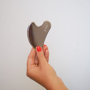 Gua sha. Full front view